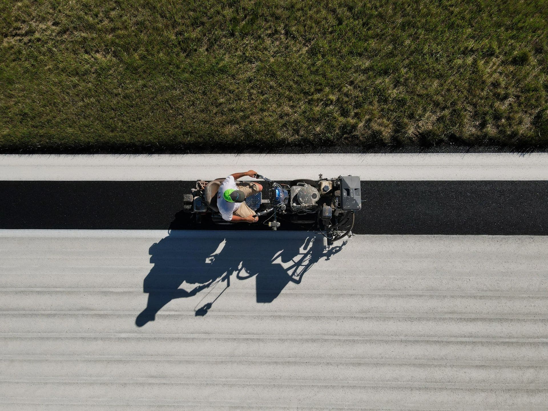 Laying a fresh line on new asphalt